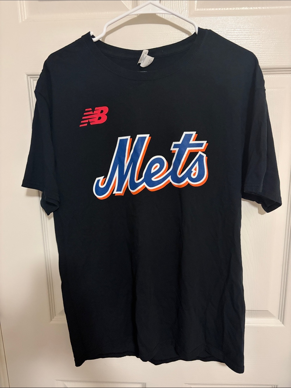 New Balance Black Mets Script Tee with Blue & Orange Logo